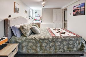 a bedroom with a bed and a desk at Viewtiful Stay in Ladysmith