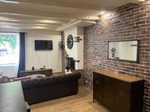 Μια τηλεόραση ή/και κέντρο ψυχαγωγίας στο Appartement Limoges