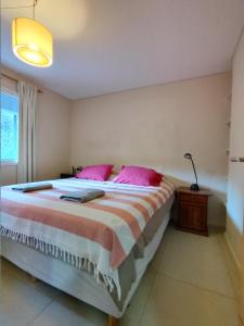 Postel nebo postele na pokoji v ubytování Departamento Ramayon + 3 fotografie