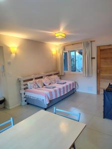 Postel nebo postele na pokoji v ubytování Departamento Ramayon