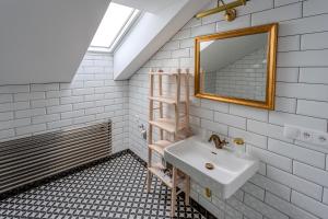 Uma casa de banho em Apartmány U Devíti Lvů