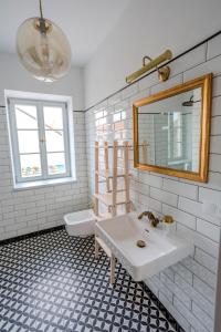 Uma casa de banho em Apartmány U Devíti Lvů