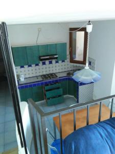 Appartamenti Castello tesisinde bir odada yatak veya yataklar