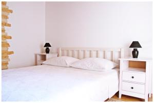 Postel nebo postele na pokoji v ubytování Guest House Tragurion