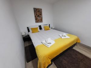 Postel nebo postele na pokoji v ubytování CASA ROXI