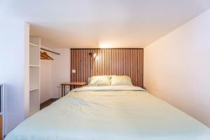 En eller flere senge i et værelse på LOFT Netflix et place gratuite proche Transport