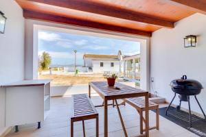 Fotografie z fotogalerie ubytování Casa Ramiro II Escapadinha na Ilha da Culatra v destinaci Ilha da Culatra