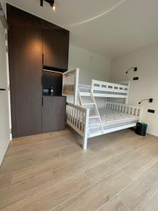 Tempat tidur dalam kamar di Manteka Logies