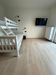 Tempat tidur dalam kamar di Manteka Logies