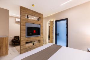 TV a/nebo společenská místnost v ubytování East Pyramids View Hotel