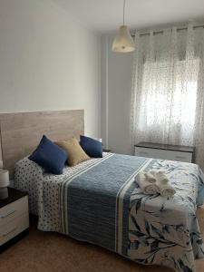 Postel nebo postele na pokoji v ubytování Punta Umbria Apartment