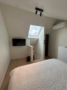 Tempat tidur dalam kamar di Manteka Logies