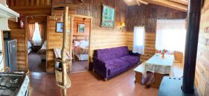 Posezení v ubytování Cabañas y Hostal Isla Mágica