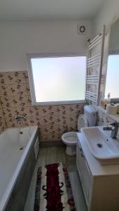 Ванная комната в Iris studio spacious apartment