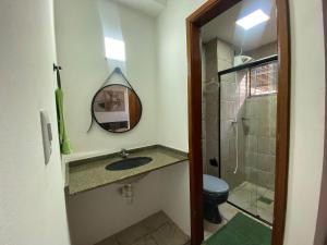 Koupelna v ubytování Apartamento região central + 23 fotografií