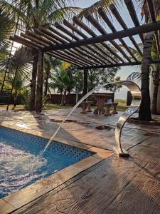 Πισίνα στο ή κοντά στο Chacara Talisma 3