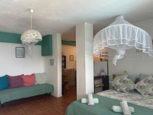 Letto o letti in una camera di TI coin de paradis Frangipanier