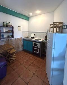 Kuchyň nebo kuchyňský kout v ubytování TI coin de paradis Frangipanier