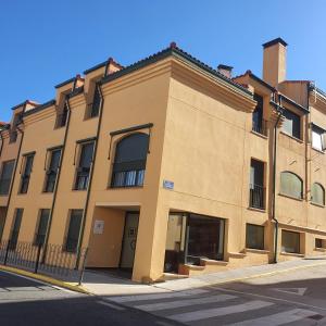 a building on the corner of a street at Estancia en Bernuy SEGOVIA VUT-40-808 in Bernúy de Porreros