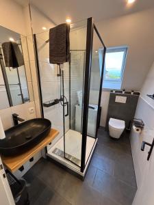 Ένα μπάνιο στο Organgerie Lemon Loft