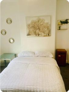 Ένα ή περισσότερα κρεβάτια σε δωμάτιο στο A nice private room in a shared house