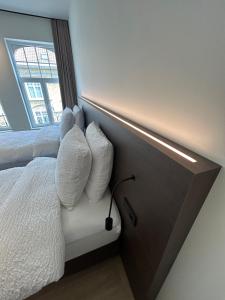 Tempat tidur dalam kamar di Manteka Logies