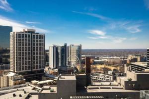 a view of a city skyline with tall buildings at The Ritz-Carlton Atlanta in Atlanta
