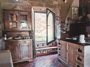 Kuchyň nebo kuchyňský kout v ubytování La Casa dei Carrai