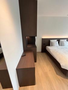 Tempat tidur dalam kamar di Manteka Logies