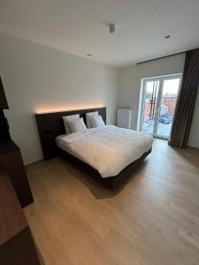 Tempat tidur dalam kamar di Manteka Logies