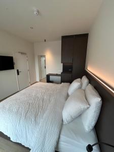 Tempat tidur dalam kamar di Manteka Logies