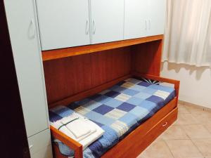 Posteľ alebo postele v izbe v ubytovaní Residence Olbia