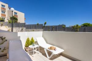 Balkon lub taras w obiekcie A beautiful apartment with a beach view - La Tejita - El Medano