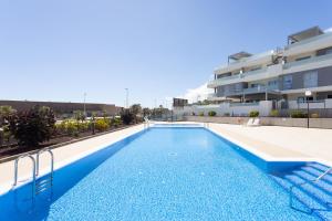 Basen w obiekcie A beautiful apartment with a beach view - La Tejita - El Medano lub w pobliżu