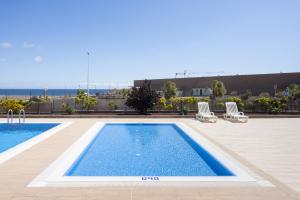 Basen w obiekcie A beautiful apartment with a beach view - La Tejita - El Medano lub w pobliżu
