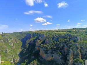 an aerial view of the blue mountains at Gravina House in Castellaneta