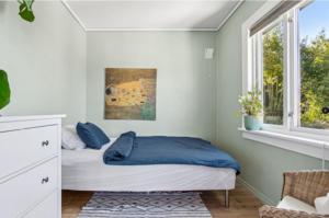 Postel nebo postele na pokoji v ubytování Bright apartment with mountain views