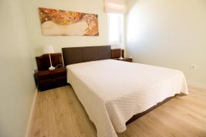 Postel nebo postele na pokoji v ubytování Casa do Sol - Turismo Rural - Nazaré Alcobaça + 26 fotografií