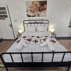 Postel nebo postele na pokoji v ubytování Appartement S&K House