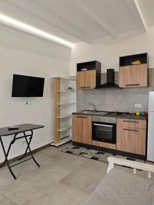 Η κουζίνα ή μικρή κουζίνα στο Case Victoria - Mamalu +8 φωτογραφίες