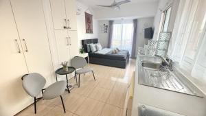 Kuchyň nebo kuchyňský kout v ubytování PMP Adamia Apartments