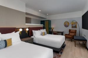 Hotel Indigo West Chester - Downtown by IHG客房内的一张或多张床位