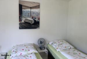 Ένα ή περισσότερα κρεβάτια σε δωμάτιο στο EnjoyLucerne