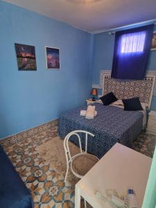 Katil atau katil-katil dalam bilik di Riad Nostalgie of Tetouan