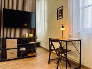 A television and/or entertainment centre at Studio Trinity