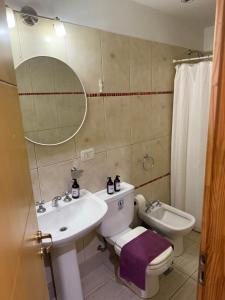 Ein Badezimmer in der Unterkunft Complejo Pampa