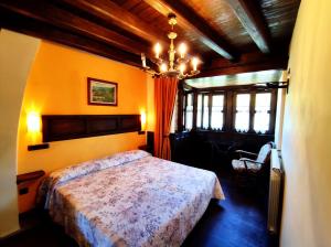 A bed or beds in a room at Casa de Aldea El Torrexon