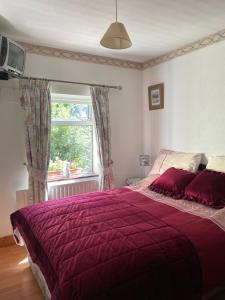 Postel nebo postele na pokoji v ubytování Achill View B&B + 32 fotografií