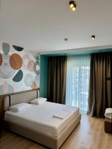 Katil atau katil-katil dalam bilik di Monun Hotel