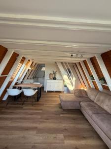 Posezení v ubytování Ferienhaus in Immenstaad - faszinierender Panorama See Blick